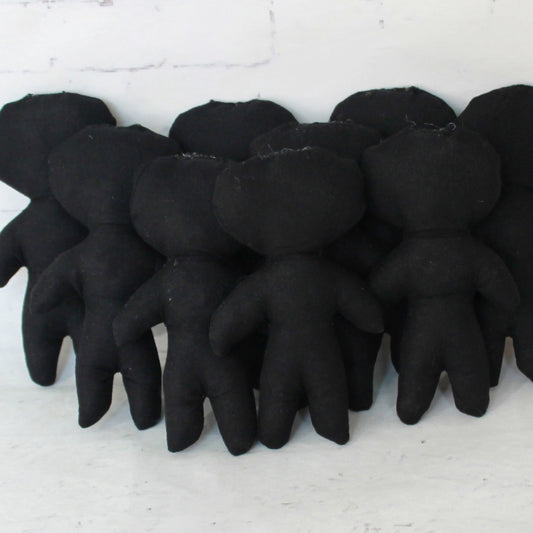 Blank handmade voodoo doll body for DIY craft, gothic decor, and Halloween projects