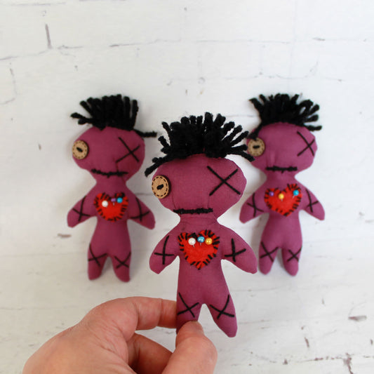 Success-themed voodoo dolls – handmade purple charms for spiritual gifting