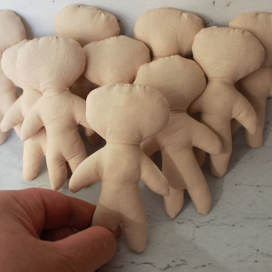 Set of 10 beige blank voodoo doll bodies for DIY crafts, Halloween decorations, and witchy handmade projects